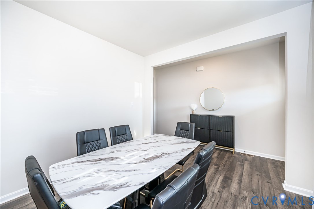 116 Leonard Way Aylett, VA 23009 - Photo 8 of 36 a bedroom with a bed and a table