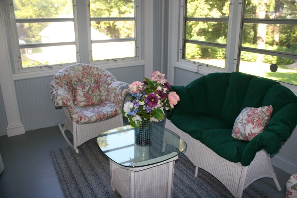 104 Shefford Street Springfield, MA 01107 - Photo 6 of 18 a dining room with furniture and a potted plant
