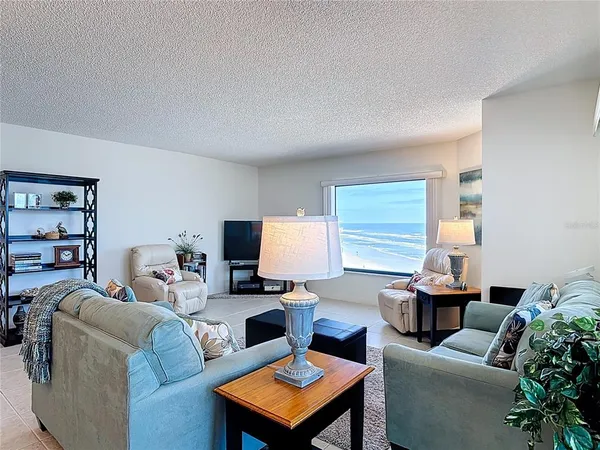 a view of a livingroom with furniture