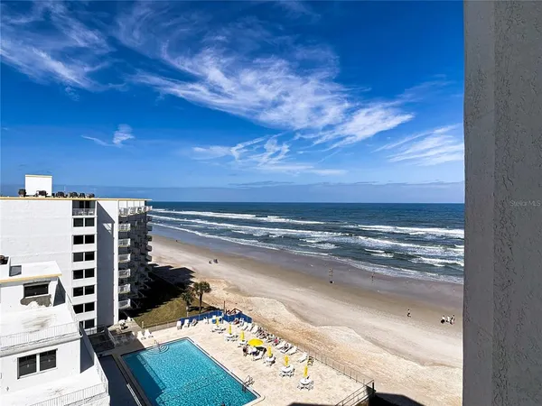 a balcony with an outdoor space