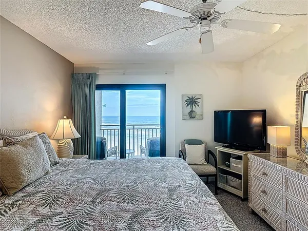 a view of a balcony from a hallway