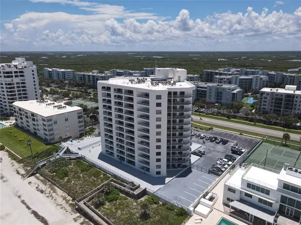 a view of a city with tall buildings