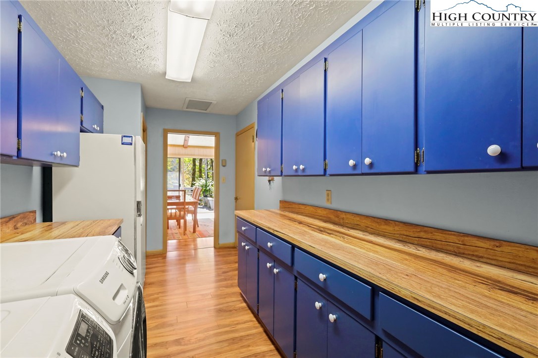202 Cliffside Lane Seven Devils, NC 28604 - Photo 15 of 46 a kitchen with a sink and cabinets