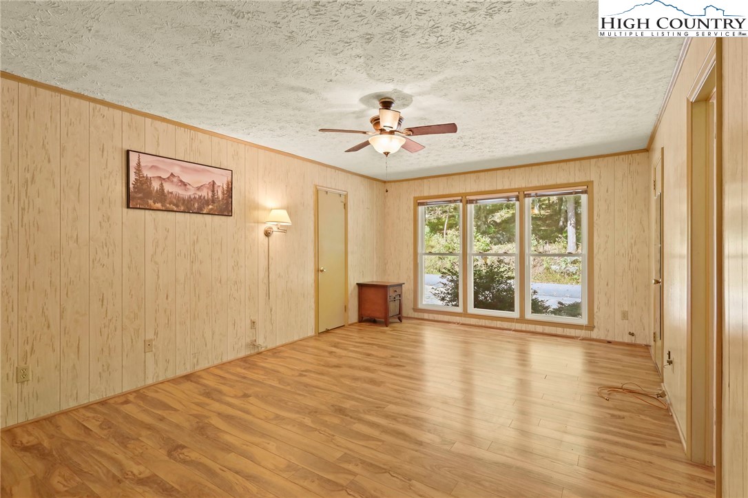 202 Cliffside Lane Seven Devils, NC 28604 - Photo 20 of 46 a view of an empty room with a window