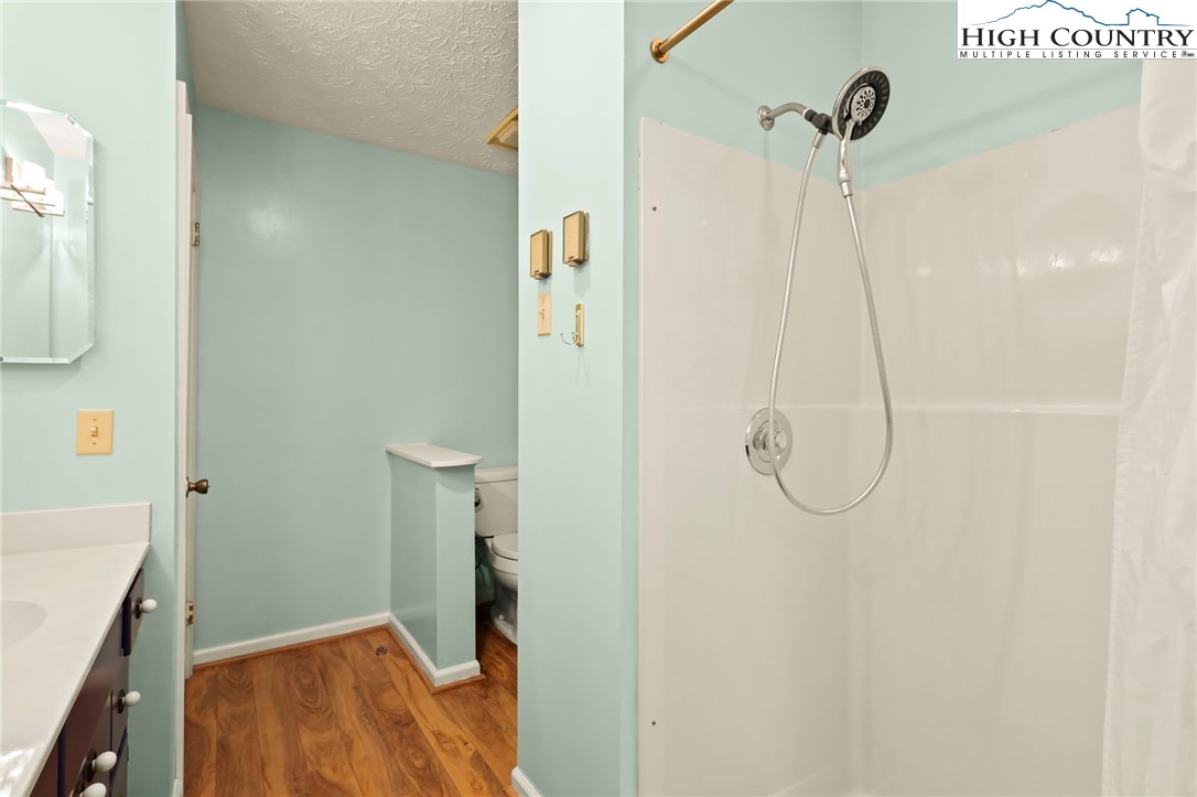 202 Cliffside Lane Seven Devils, NC 28604 - Photo 30 of 46 a bathroom with a shower