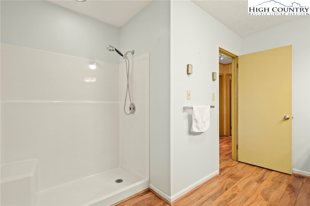 202 Cliffside Lane Seven Devils, NC 28604 - Photo 37 of 46 a bathroom with a shower