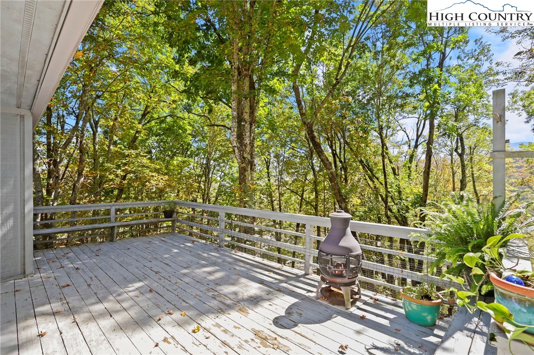 202 Cliffside Lane Seven Devils, NC 28604 - Photo 41 of 46 a view of a wooden bridge