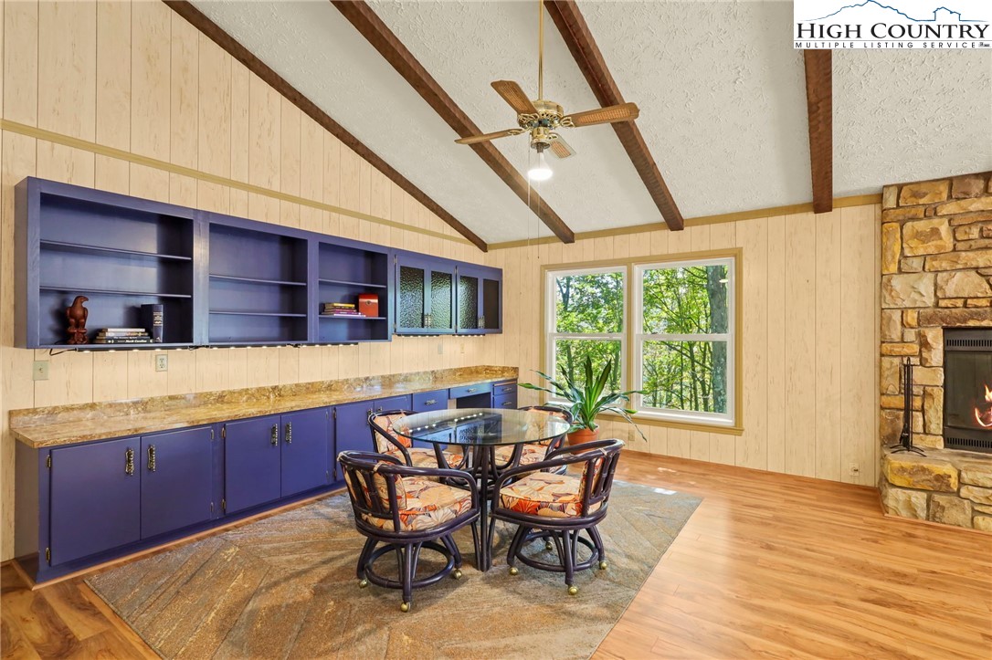 202 Cliffside Lane Seven Devils, NC 28604 - Photo 8 of 46 a view of a dining room with furniture and a table