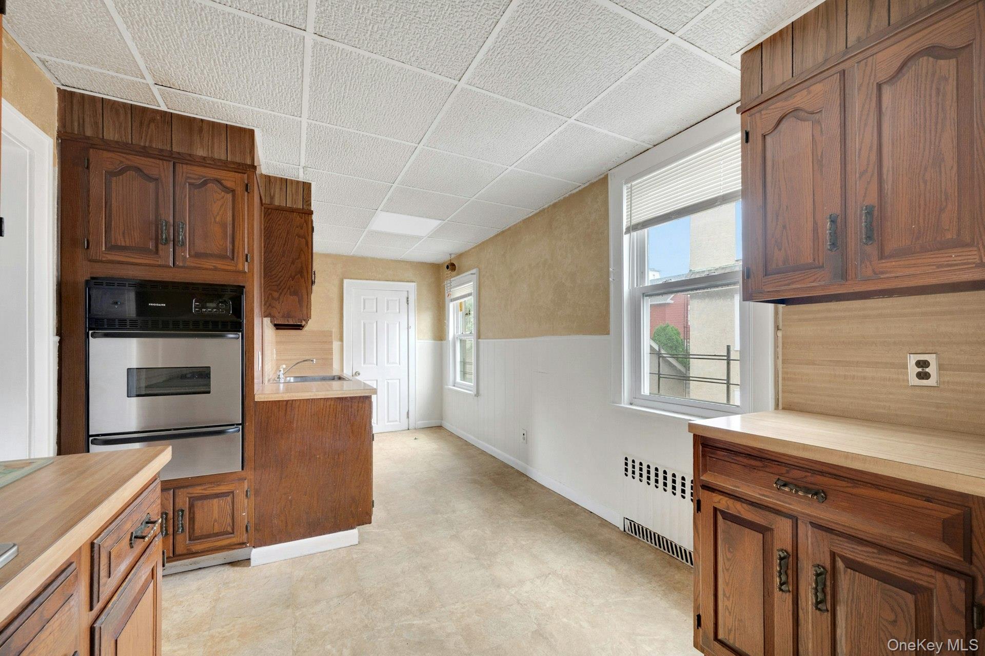 26 4th Street New Rochelle, NY 10801 - Photo 5 of 26 Second Floor Kitchen with storage