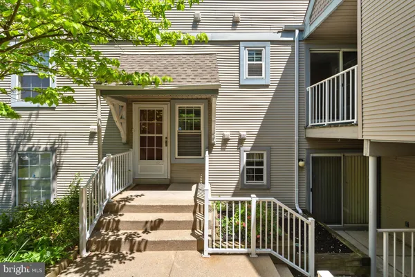 a view of a house with a porch