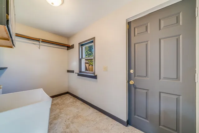 a view of a hallway with closet