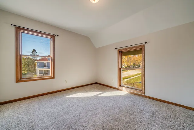 a view of an empty room and window