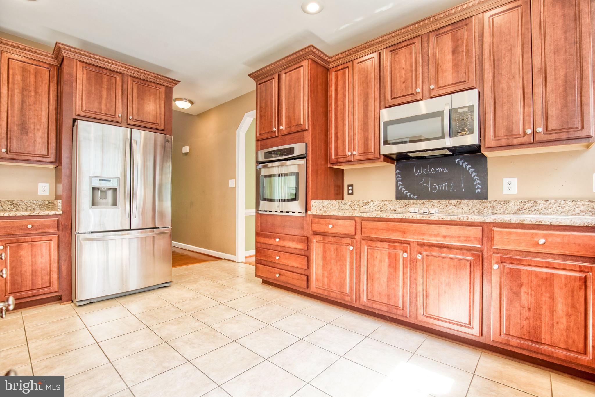 68 MacGregor Ridge Road Stafford, VA 22554 - Photo 12 of 42 Stainless Steel Appliances and Granite Countertops