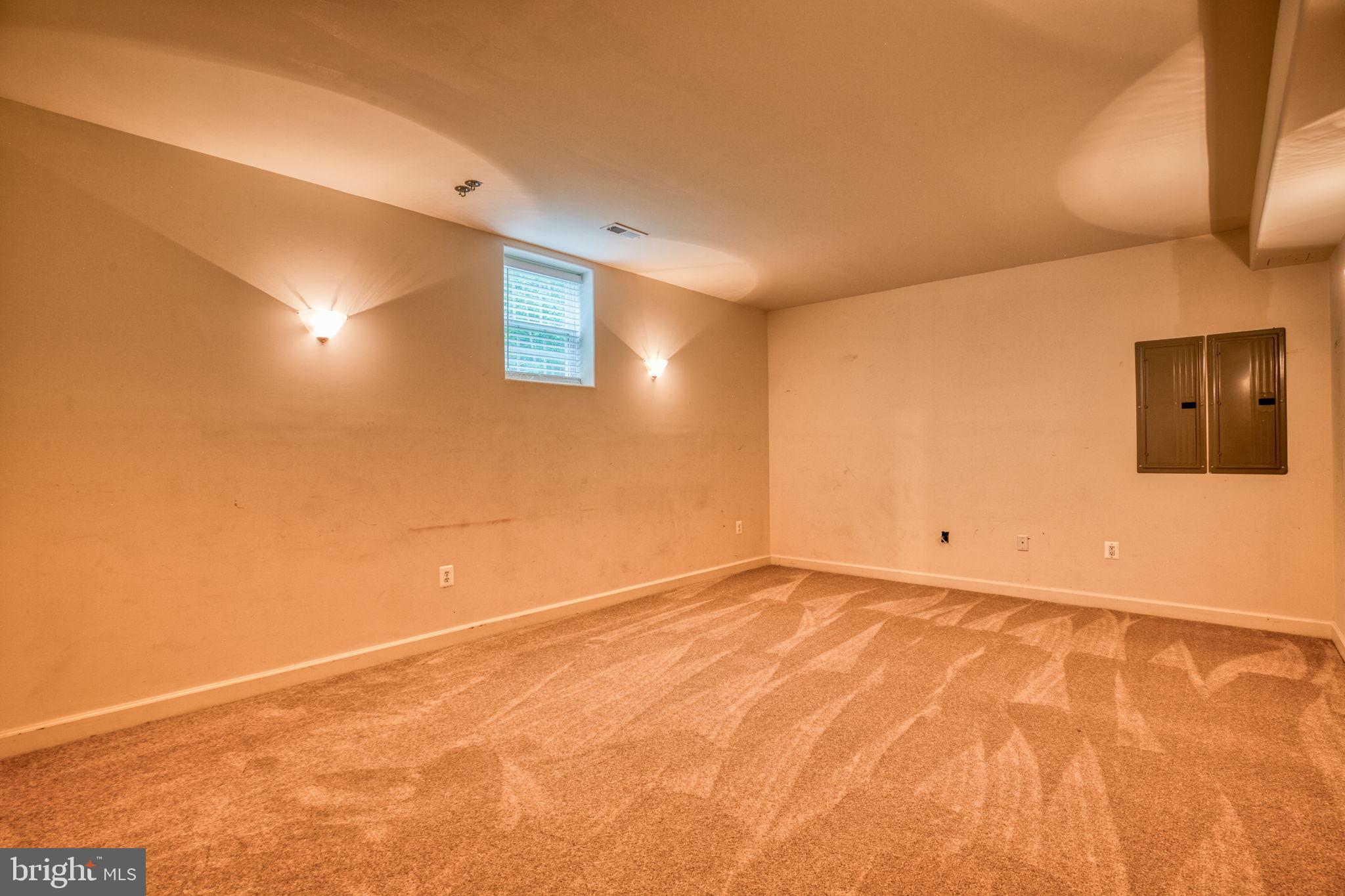 68 MacGregor Ridge Road Stafford, VA 22554 - Photo 32 of 42 Step from the Man Cave into the Theater Room