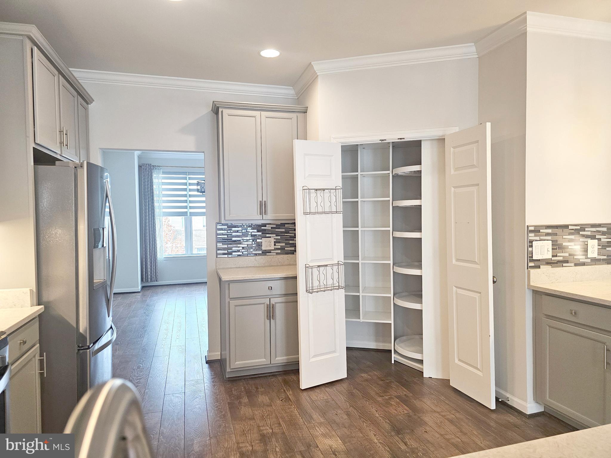 3510 Landing Way Silver Spring, MD 20906 - Photo 18 of 47 a view of kitchen with refrigerator cabinets and wooden floor