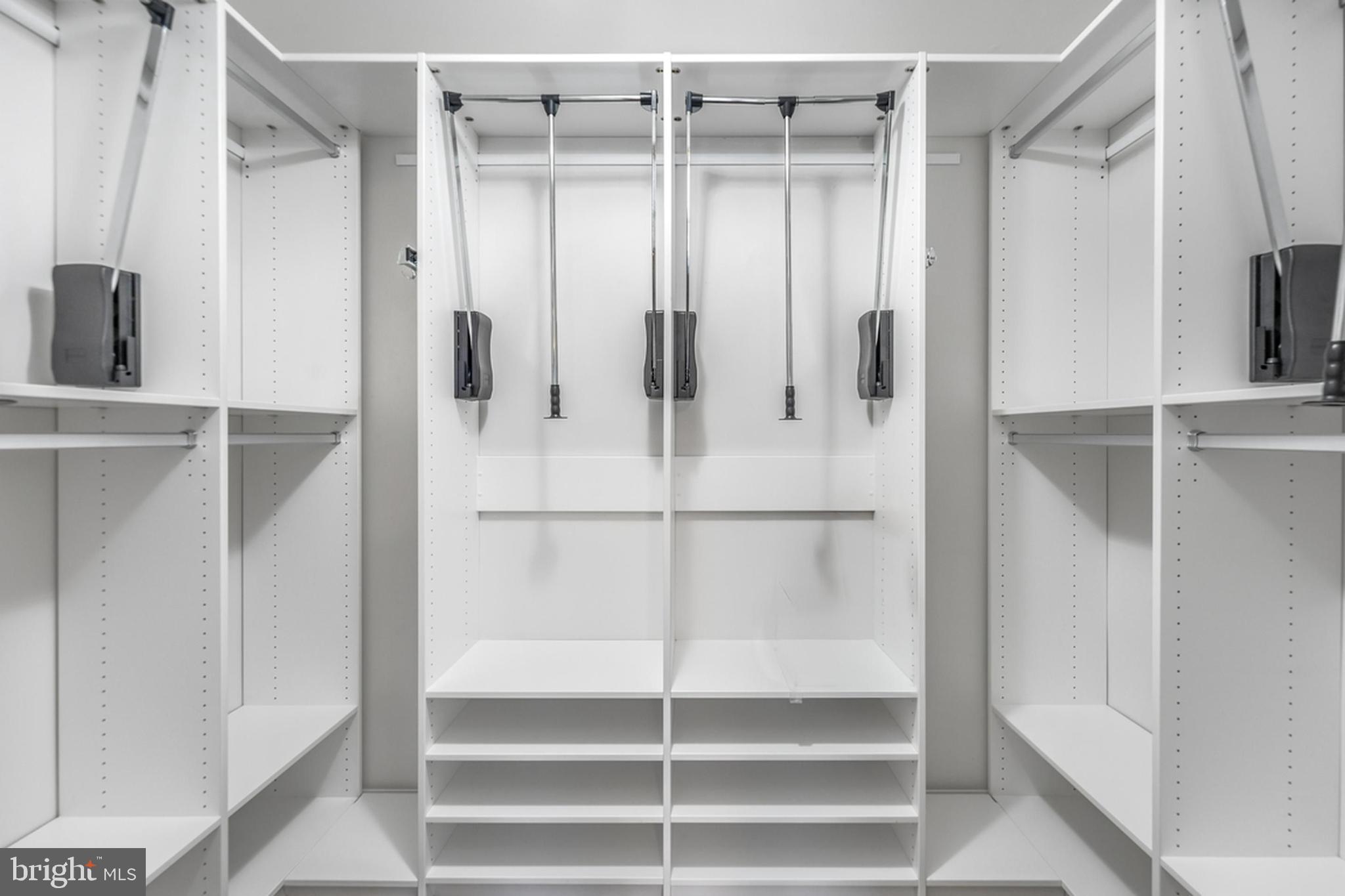 3510 Landing Way Silver Spring, MD 20906 - Photo 26 of 47 a view of walk in closet with empty racks