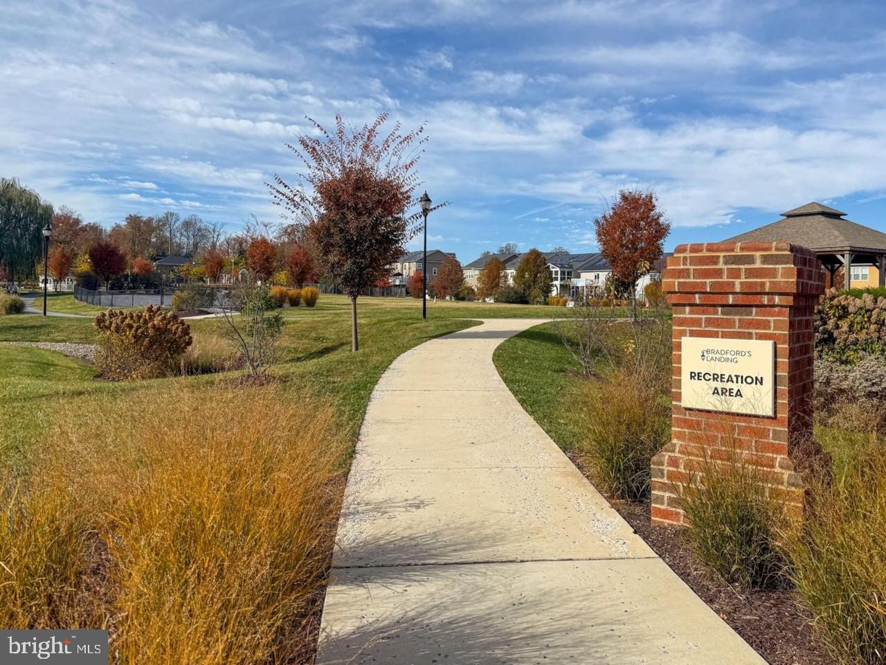 3510 Landing Way Silver Spring, MD 20906 - Photo 44 of 47 a view of a lake with a building in the background