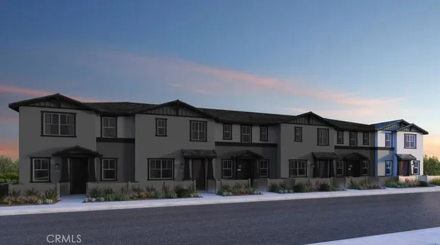 a front view of residential houses and street