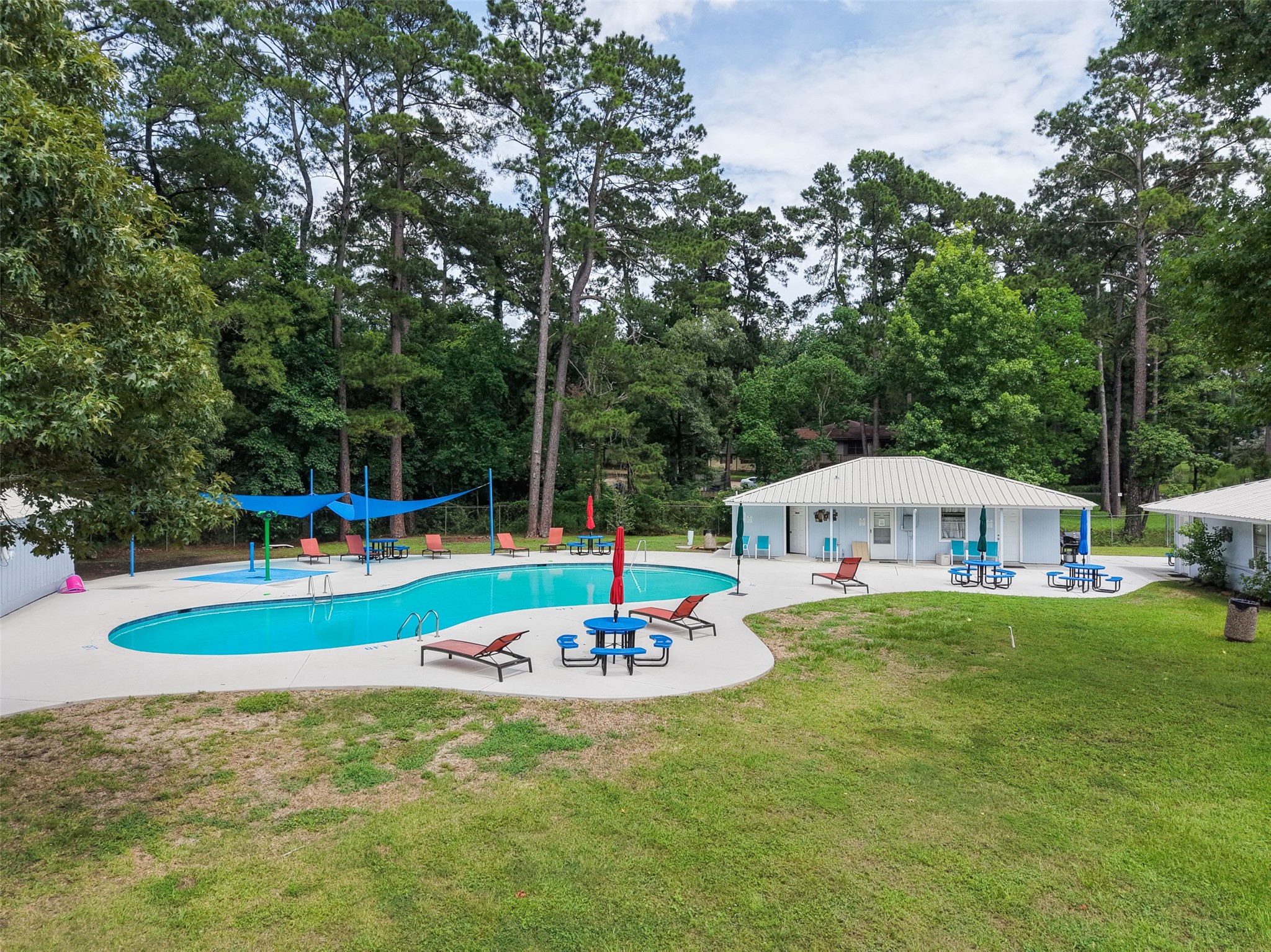 6387 Oak Knoll Road Montgomery, TX 77316 - Photo 29 of 30 a house view with a backyard space and swimming pool