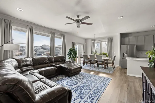 a living room with furniture and a table