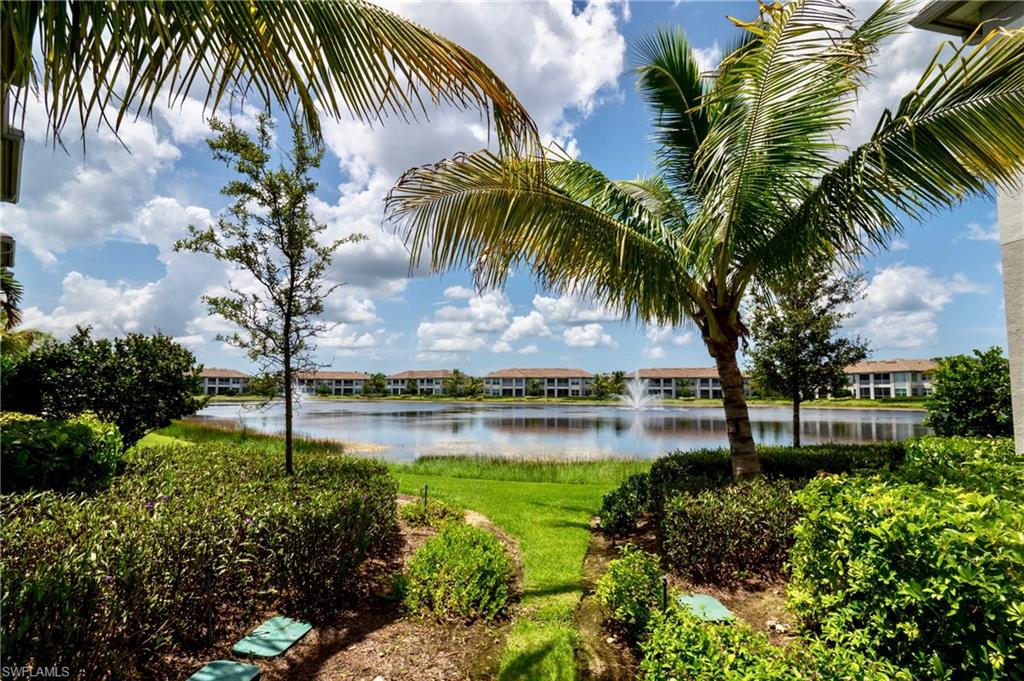 8008 Signature Club Circle Naples, FL 34113 - Photo 29 of 30 a view of swimming pool and lake view