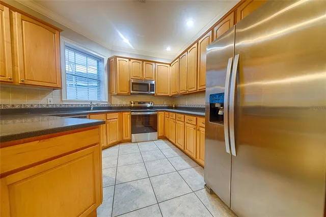 $497,500 | 7019 5 Oaks Drive, Harmony, FL 34773