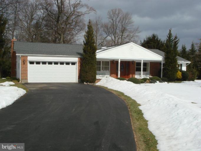 311 Whitaker Mill Road Fallston, MD 21047 - Photo 1 of 28 a view of a house with a yard covered in snow