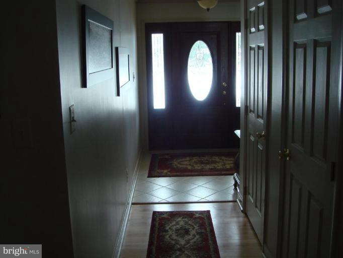 311 Whitaker Mill Road Fallston, MD 21047 - Photo 27 of 28 a view of a entryway door with wooden floor