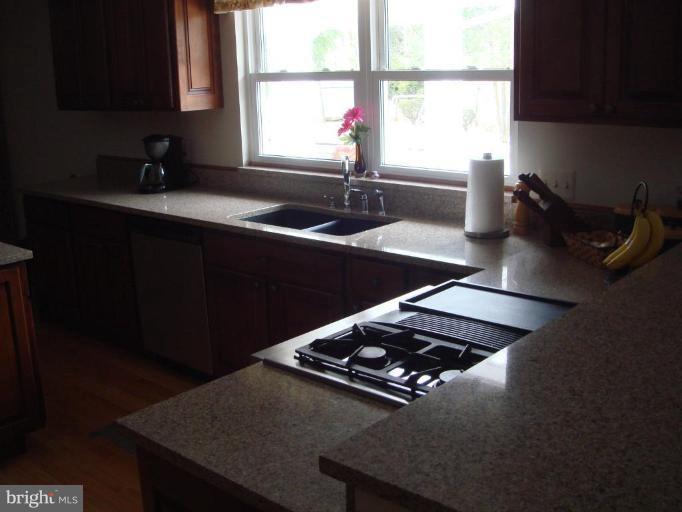 311 Whitaker Mill Road Fallston, MD 21047 - Photo 15 of 28 a kitchen with a sink appliances and a window