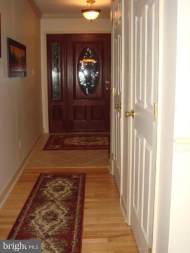 311 Whitaker Mill Road Fallston, MD 21047 - Photo 3 of 28 a view of a entryway door with wooden floor