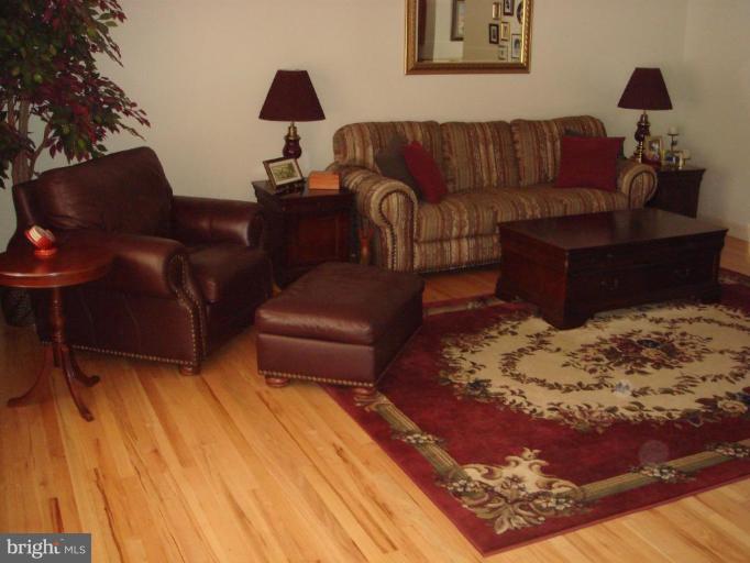 311 Whitaker Mill Road Fallston, MD 21047 - Photo 24 of 28 a living room with couches and a coffee table