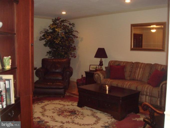 311 Whitaker Mill Road Fallston, MD 21047 - Photo 4 of 28 a living room with furniture and a potted plant