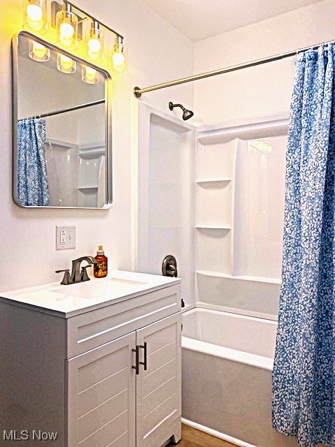 71056 Morristown Flushing Road Flushing, OH 43977 - Photo 10 of 15 Bathroom with vanity and shower / tub combo