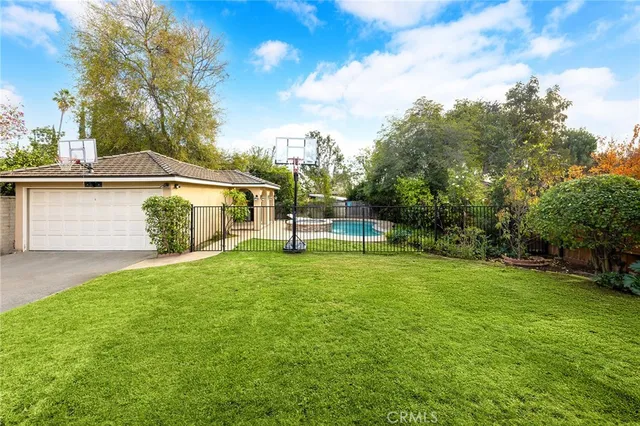 a house view with a garden space