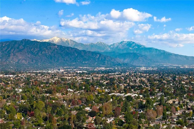 a view of mountain with sunset
