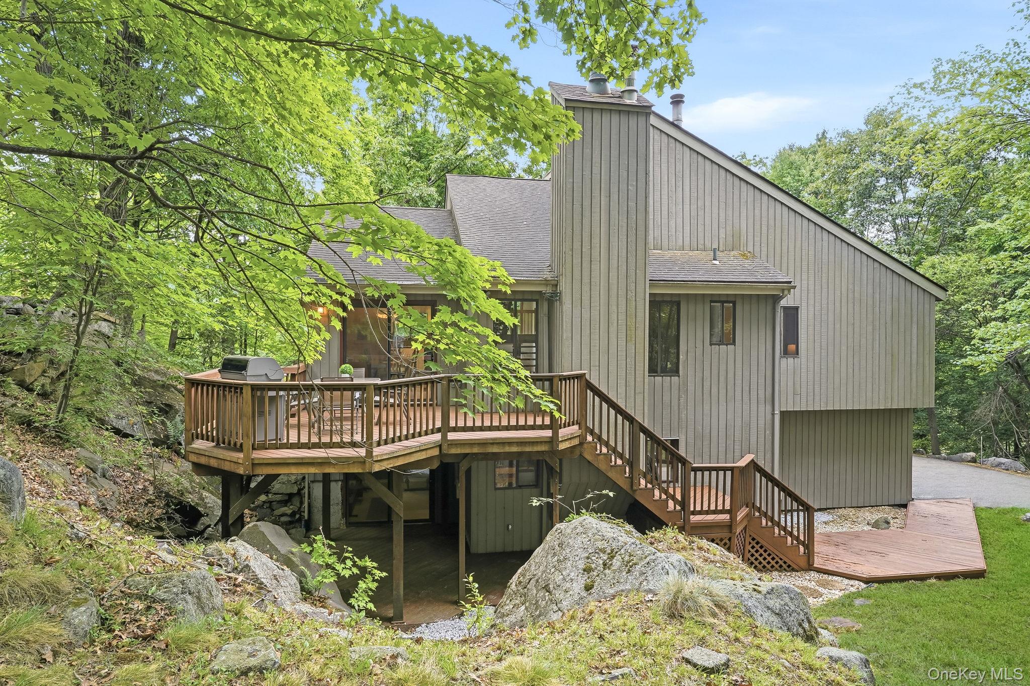 43 Powder Horn Road Cortlandt Manor, NY 10567 - Photo 29 of 35 View of the back of the home