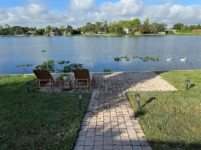 a view of a lake with outdoor space