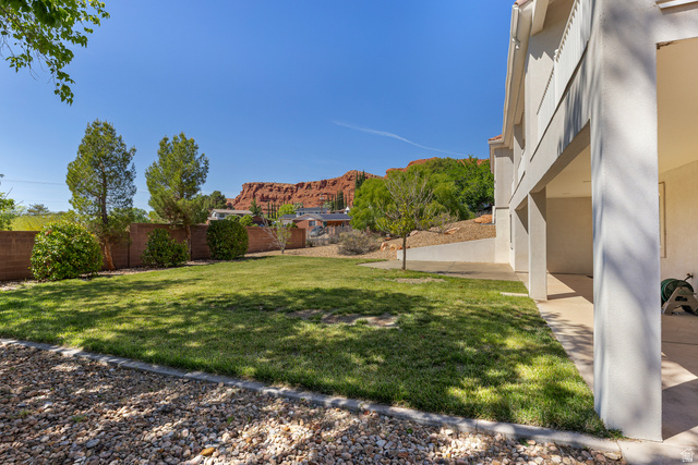389 North Main Street St. George, UT 84770 - Photo 6 of 44 Fenced backyard featuring a mountain view
