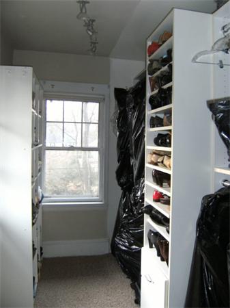 41 Prentice Road Newton, MA 02459 - Photo 16 of 28 walk in closet with window and furniture