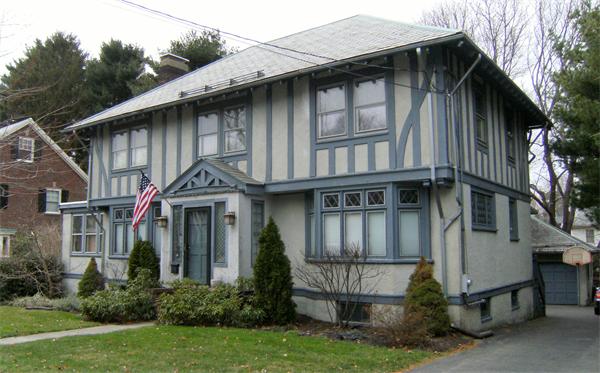 41 Prentice Road Newton, MA 02459 - Photo 2 of 28 a front view of a house with a yard