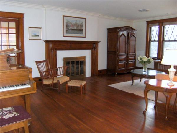 41 Prentice Road Newton, MA 02459 - Photo 3 of 28 a living room with furniture and a fireplace