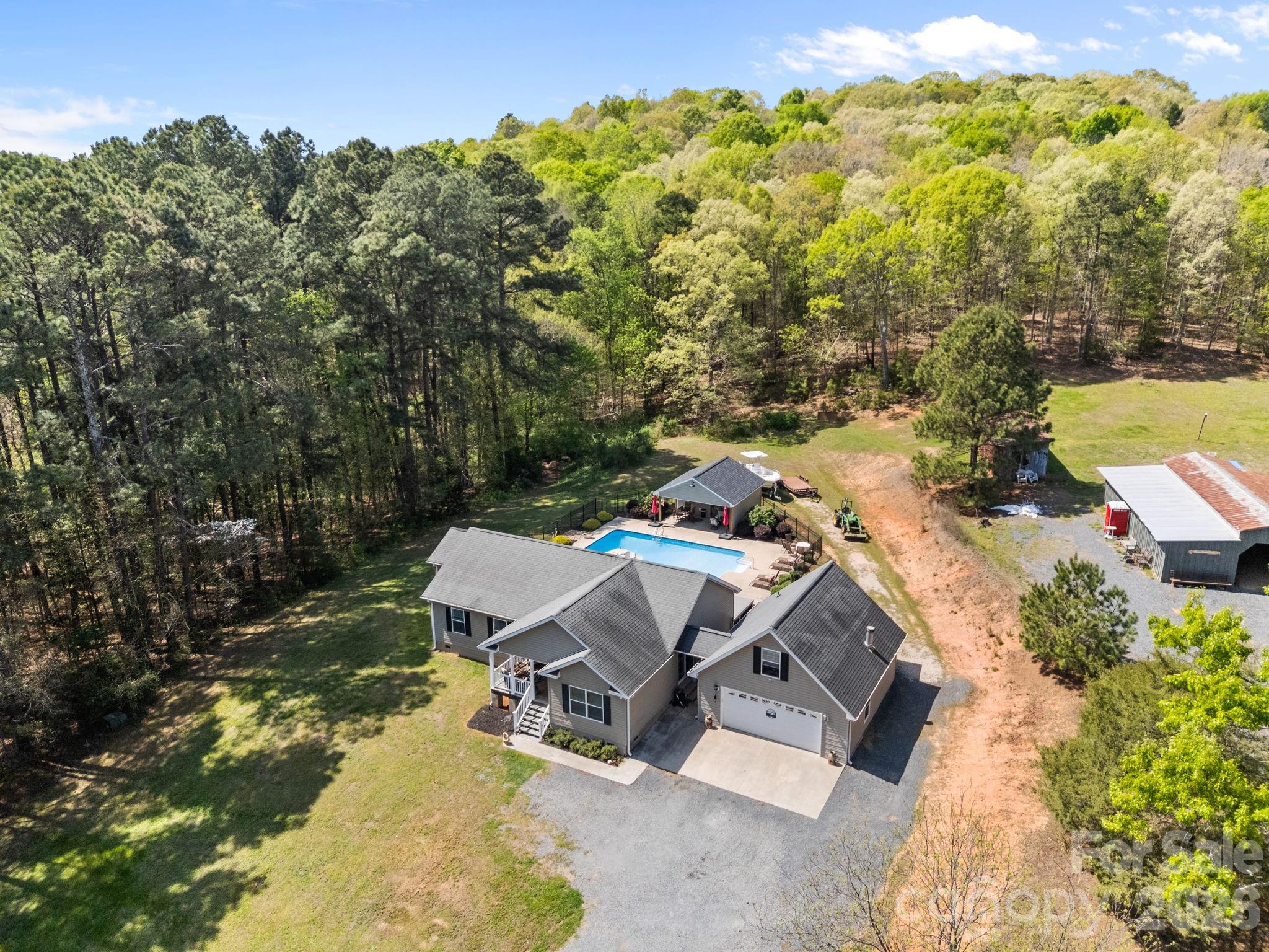 19807 Alpine Road Albemarle, NC 28001 - Photo 39 of 40 an aerial view of a house with a yard basket ball court and outdoor seating