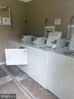 178 Elephant Road, Unit B21 Dublin, PA 18917 - Photo 17 of 17 Modern laundry facilities in neutral tones.