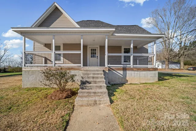 a view of a balcony with wooden floor
