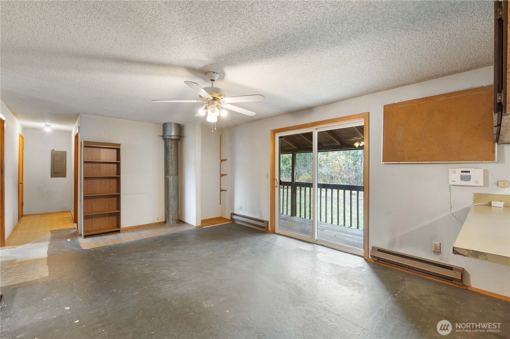 29621 Webster Road East Graham, WA 98338 - Photo 11 of 35 a view of an empty room with a window