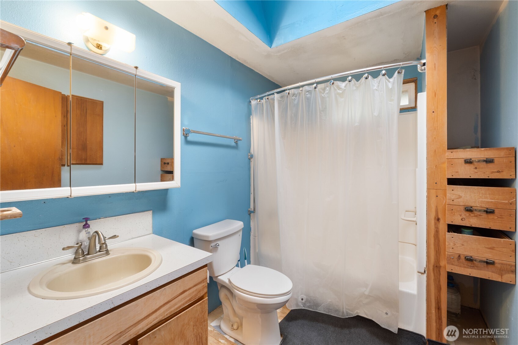 29621 Webster Road East Graham, WA 98338 - Photo 15 of 35 a bathroom with a sink toilet and mirror