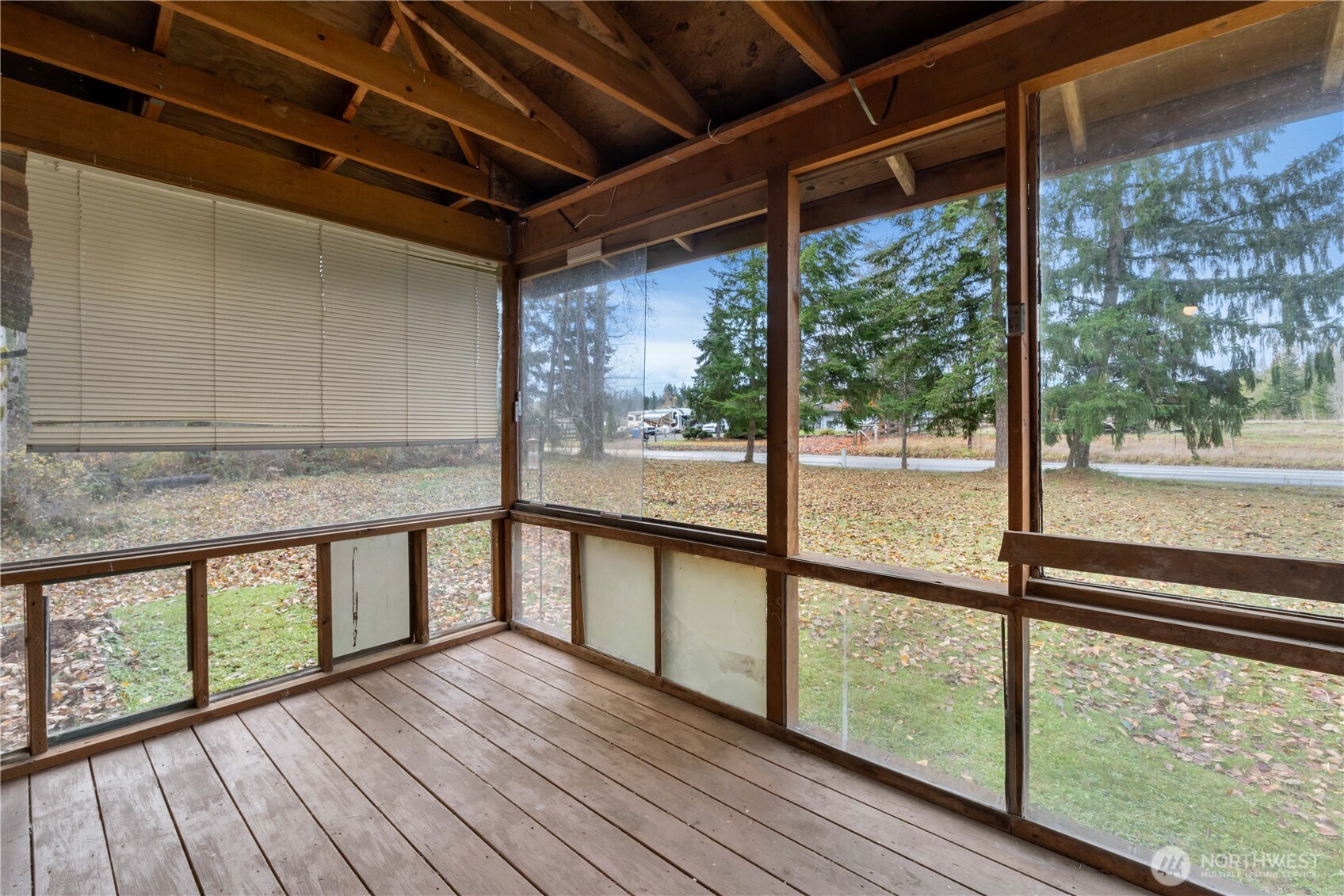 29621 Webster Road East Graham, WA 98338 - Photo 5 of 35 a view of a porch with wooden floor
