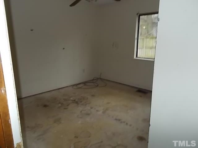 831 Horton Road Durham, NC 27704 - Photo 6 of 8 an empty room with windows