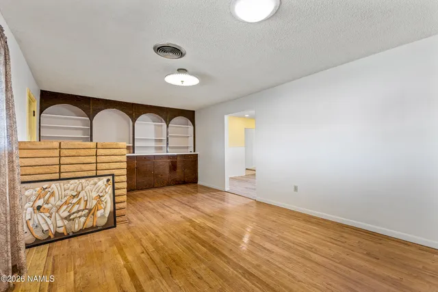 a bathroom with a tub and a window