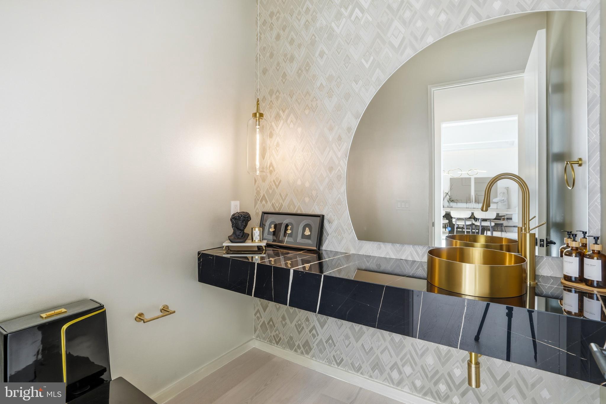 9408 Old Courthouse Road Vienna, VA 22182 - Photo 14 of 91 Sleek elegance in a modern bathroom design.